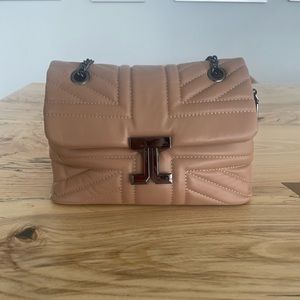 LIKE NEW: Beige cross bag bag with gunmetal finishes